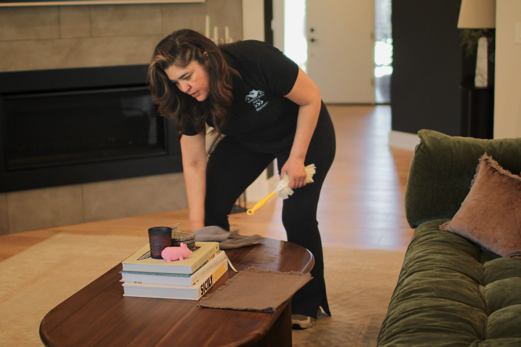 Aeroclean NWA staff wiping down kitchen counters during a standard clean in Rogers, AR