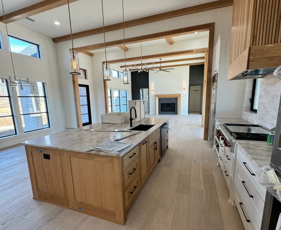 Standard house cleaning service tidying a bedroom in Bentonville, AR